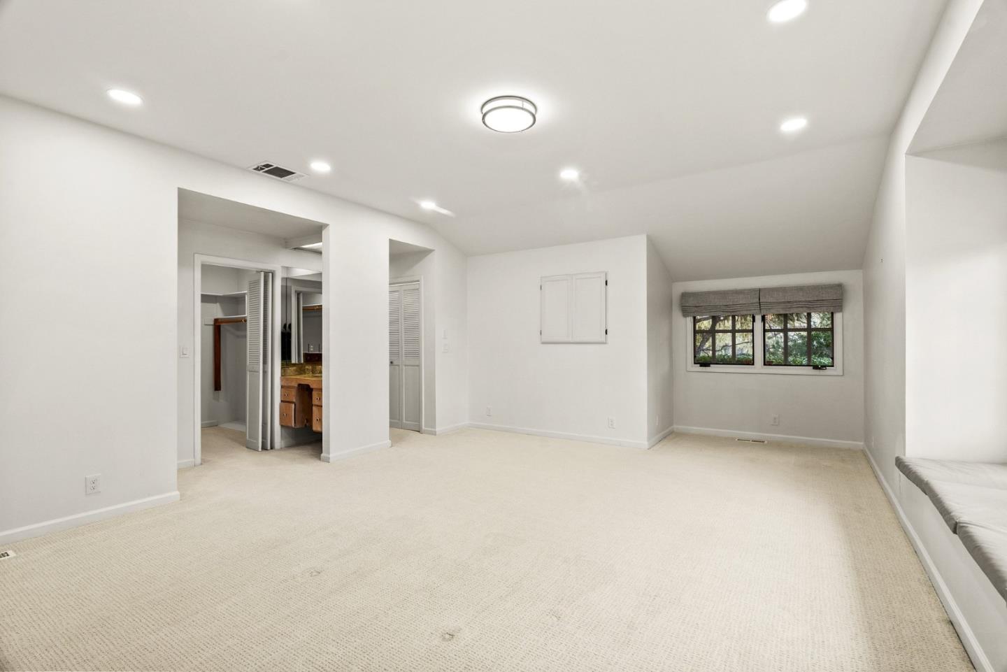 3041 Bird Rock Road Pebble Beach, CA 93953 - Photo 19 of 35 an empty room with entrance and windows