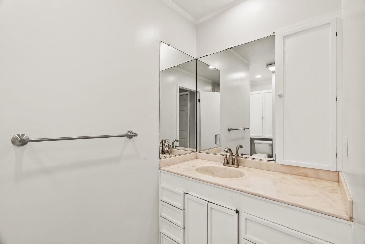 3041 Bird Rock Road Pebble Beach, CA 93953 - Photo 23 of 35 a bathroom with a sink and a mirror