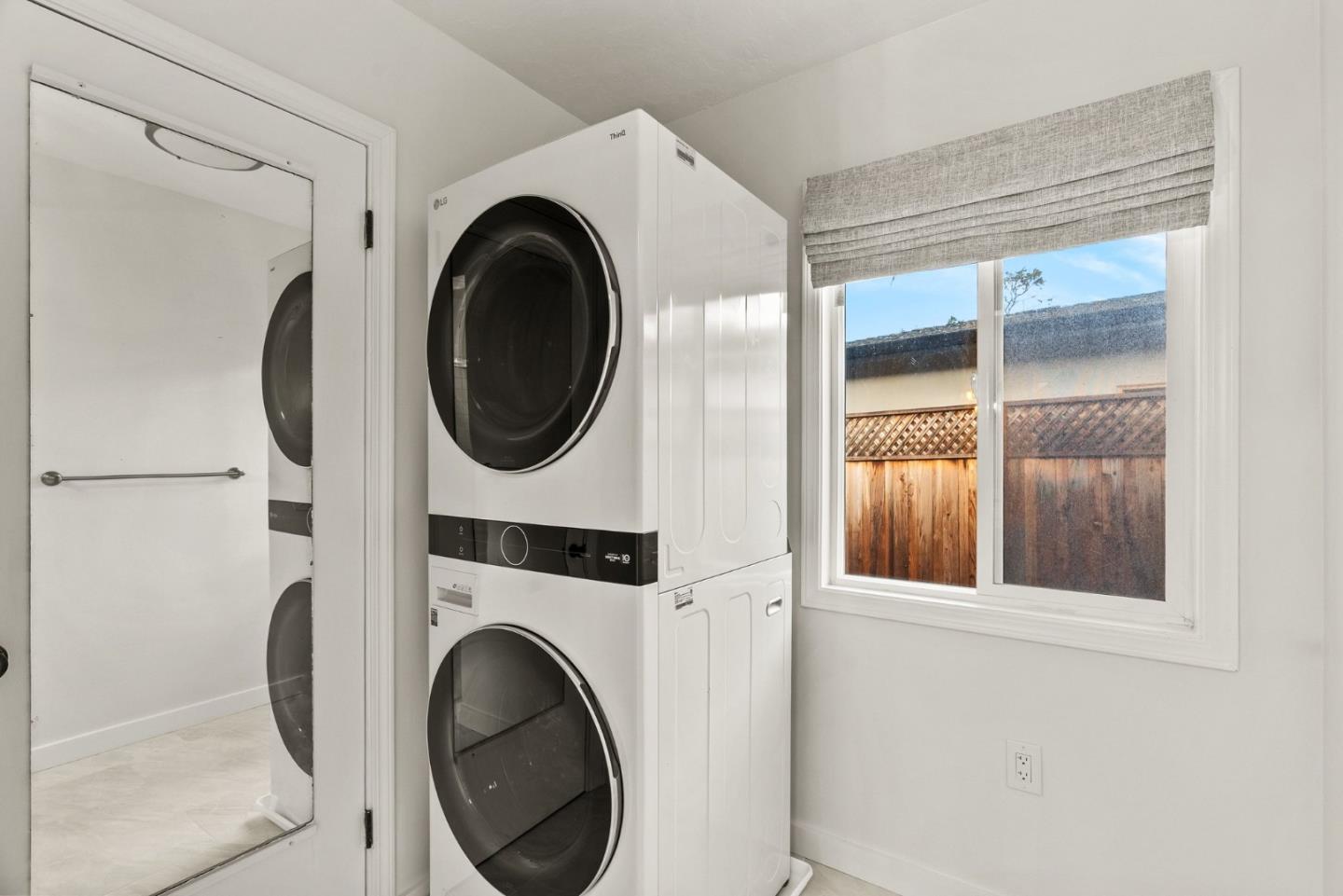 3041 Bird Rock Road Pebble Beach, CA 93953 - Photo 26 of 35 a utility room with dryer and washer
