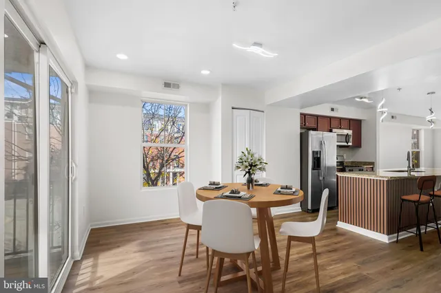 a view of kitchen with furniture and fireplace