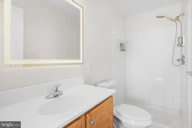 a bathroom with a sink and cabinets