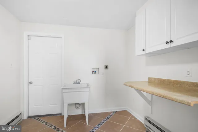 a view of a room with a large window