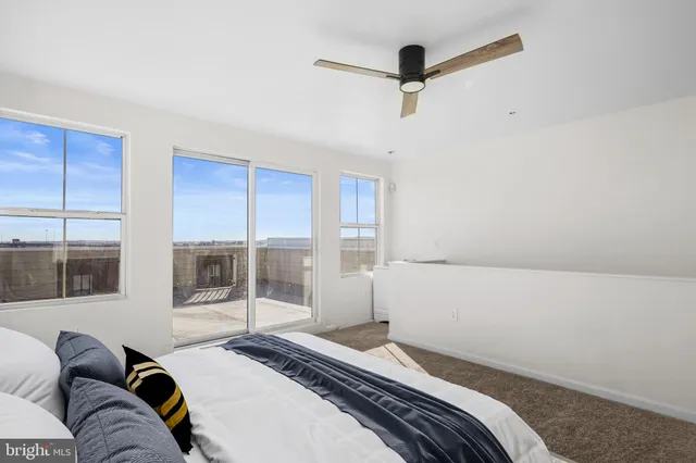 a view of a balcony with white door