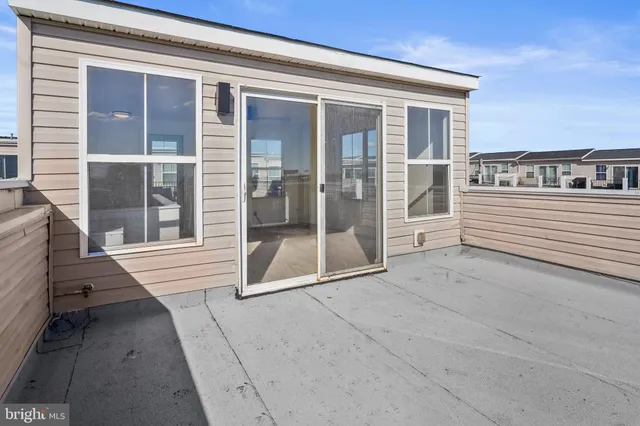 a view of a house with a roof deck