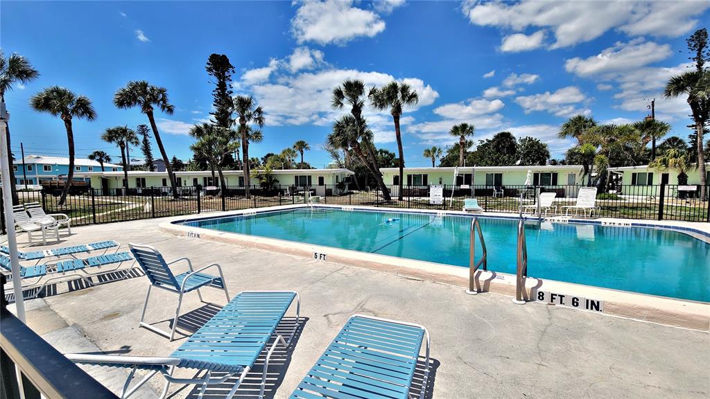 Undisclosed Address Englewood, FL 34223 - Photo 18 of 24 a view of a swimming pool with outdoor seating