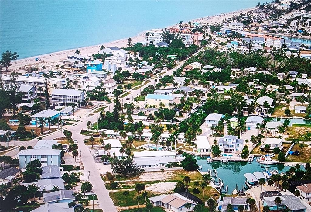 Undisclosed Address Englewood, FL 34223 - Photo 22 of 24 an aerial view of a city