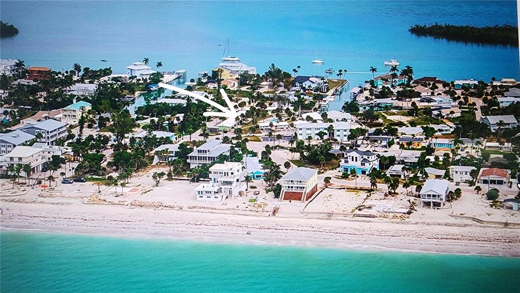 Undisclosed Address Englewood, FL 34223 - Photo 23 of 24 an aerial view of multiple house with yard