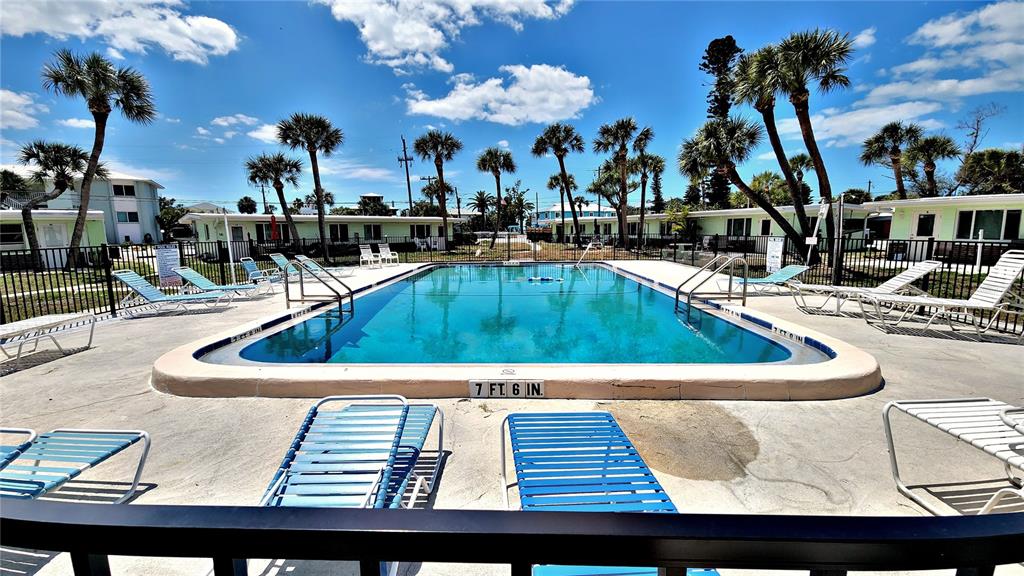 Undisclosed Address Englewood, FL 34223 - Photo 4 of 24 a view of swimming pool with outdoor seating