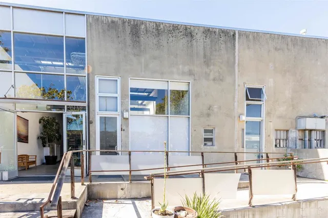 a view of a living room with furniture