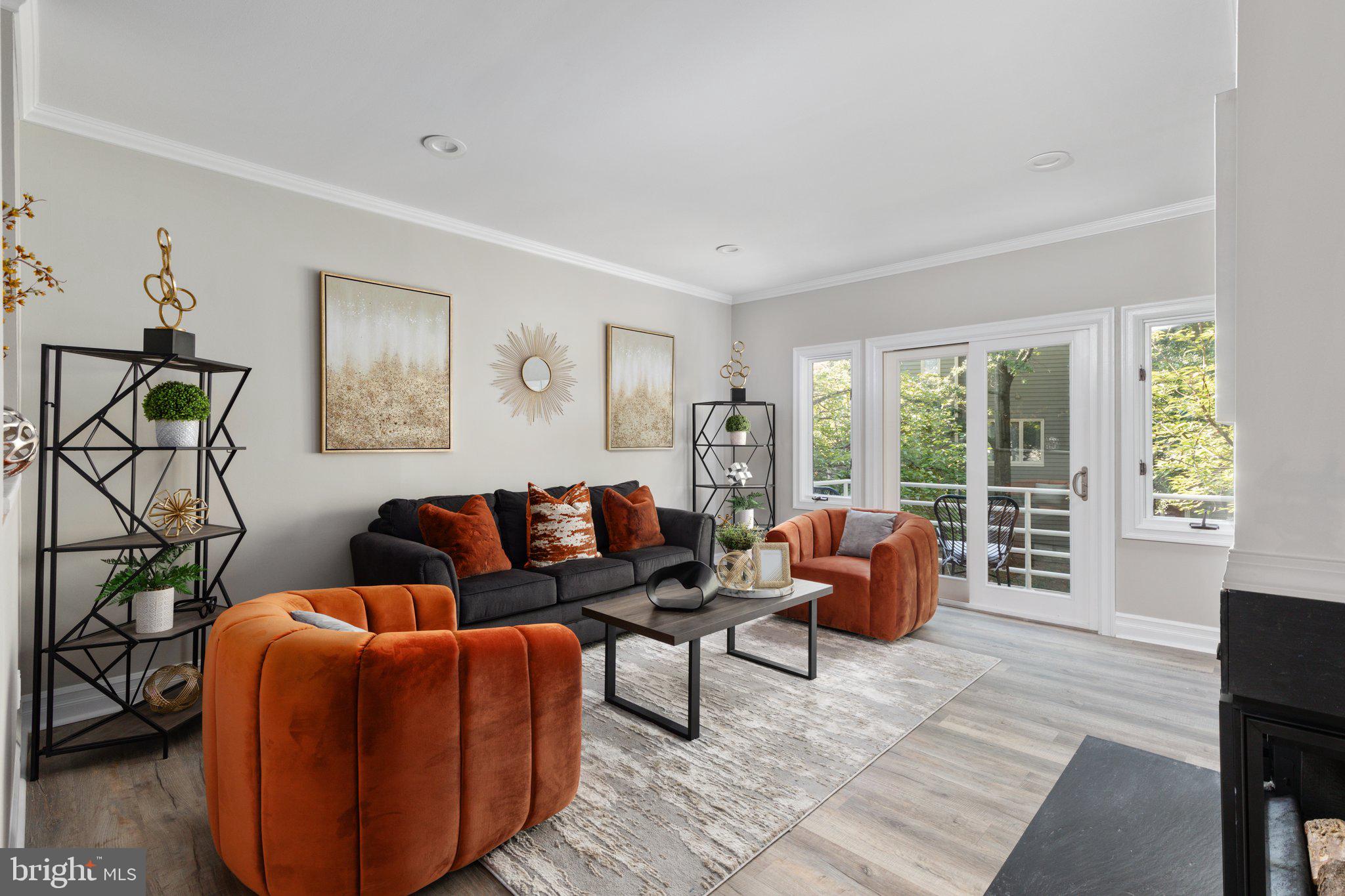 Living room with private balcony.