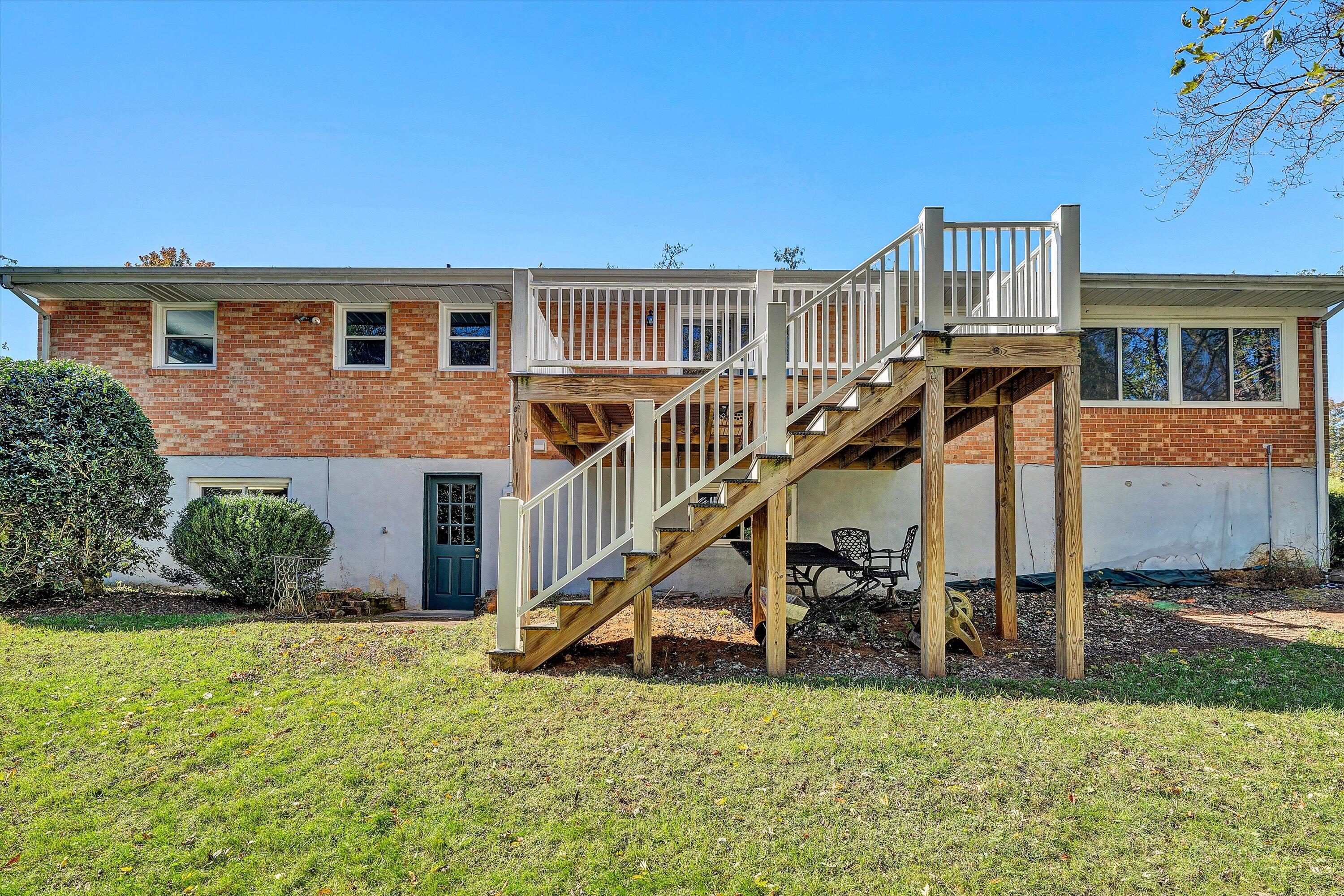 2312 Kipling Street Southwest Roanoke, VA 24018 - Photo 42 of 52 a view of a house with a swimming pool and a yard