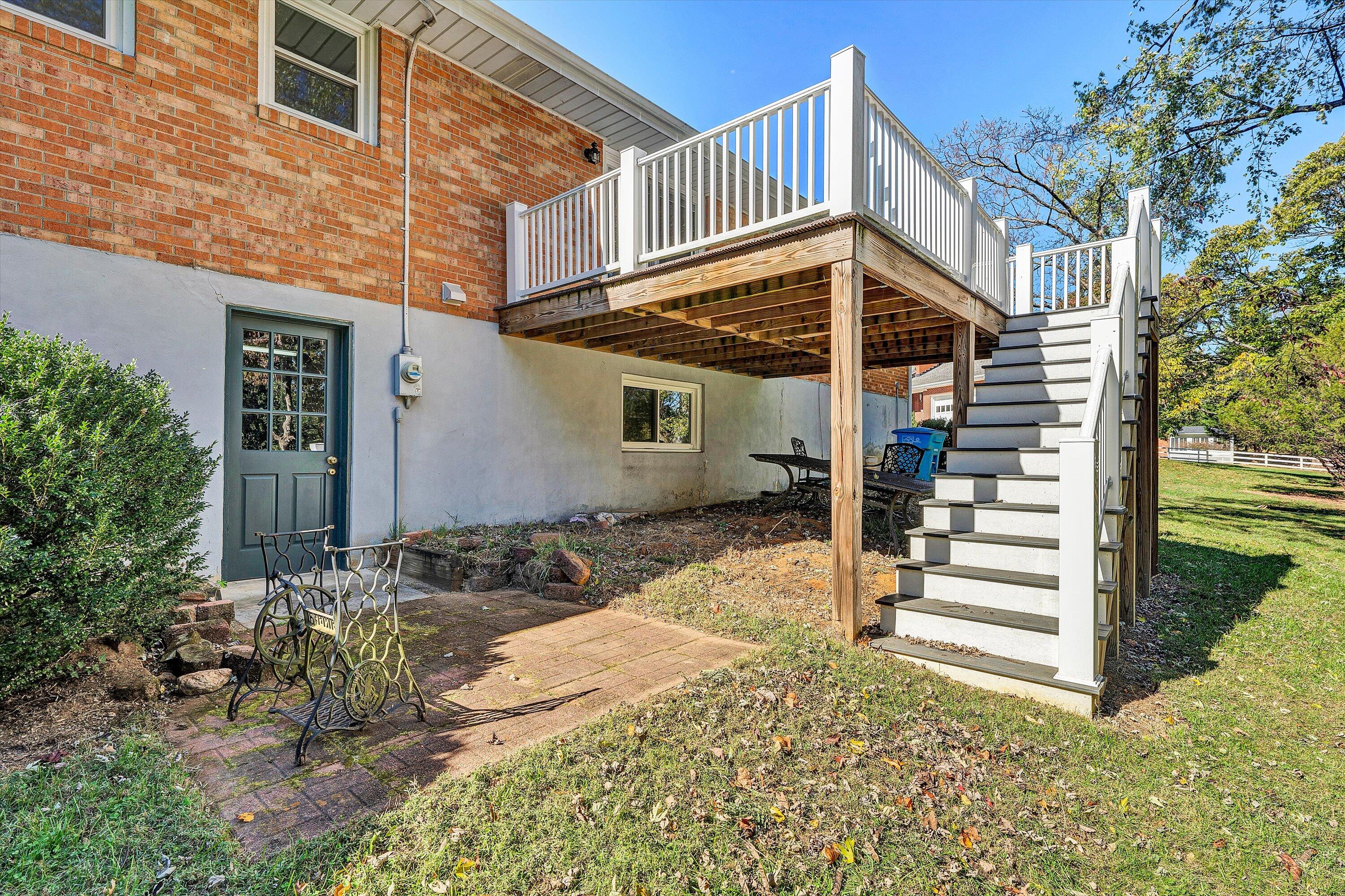 2312 Kipling Street Southwest Roanoke, VA 24018 - Photo 45 of 52 a view of a house with a yard and wooden fence