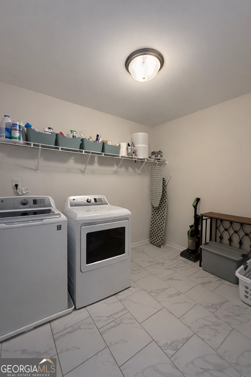 4355 Cornwall Drive Forsyth, GA 31029 - Photo 19 of 23 a kitchen with a stove and a sink