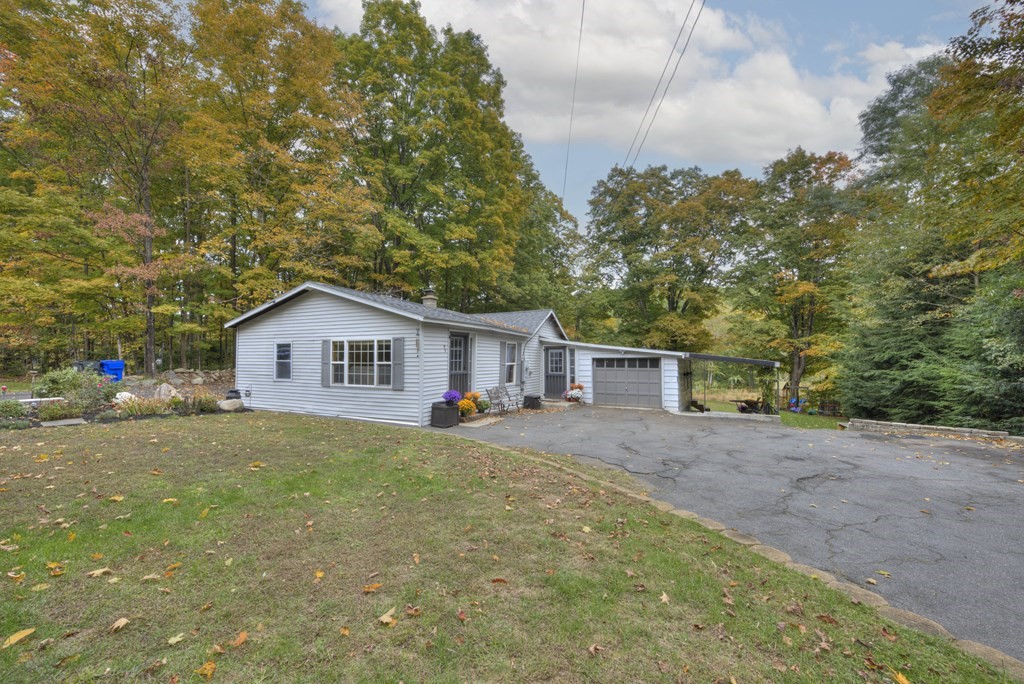 95 Sylvester Road Northampton, MA 01062 - Photo 2 of 42 a view of house with a yard and large trees