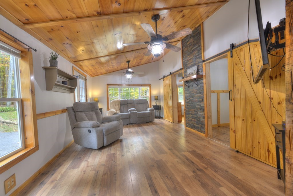 95 Sylvester Road Northampton, MA 01062 - Photo 25 of 42 a living room with furniture and a large window