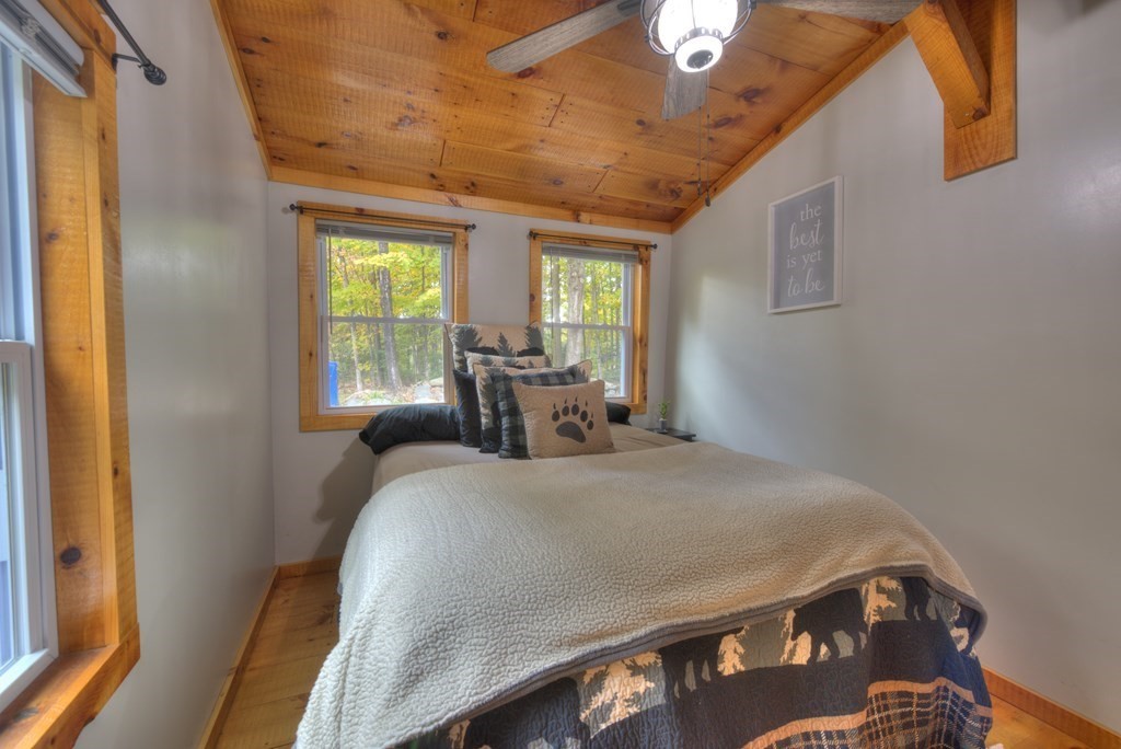 95 Sylvester Road Northampton, MA 01062 - Photo 33 of 42 a bed sitting in a bedroom next to a window
