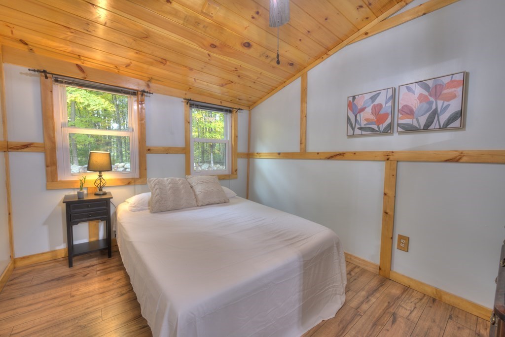 95 Sylvester Road Northampton, MA 01062 - Photo 36 of 42 a bedroom with a bed and a large window