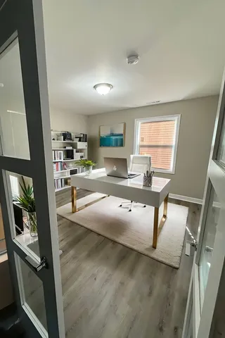 a view of a living room and a kitchen