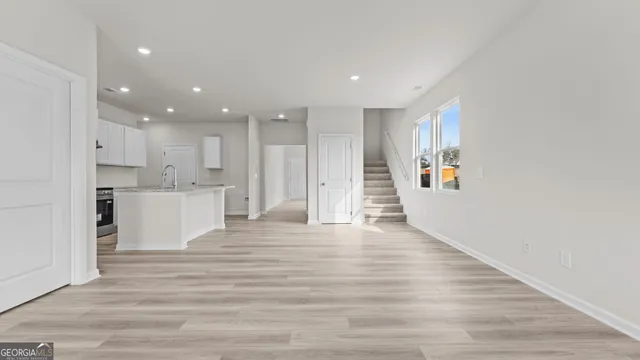 a view of kitchen with wooden floor