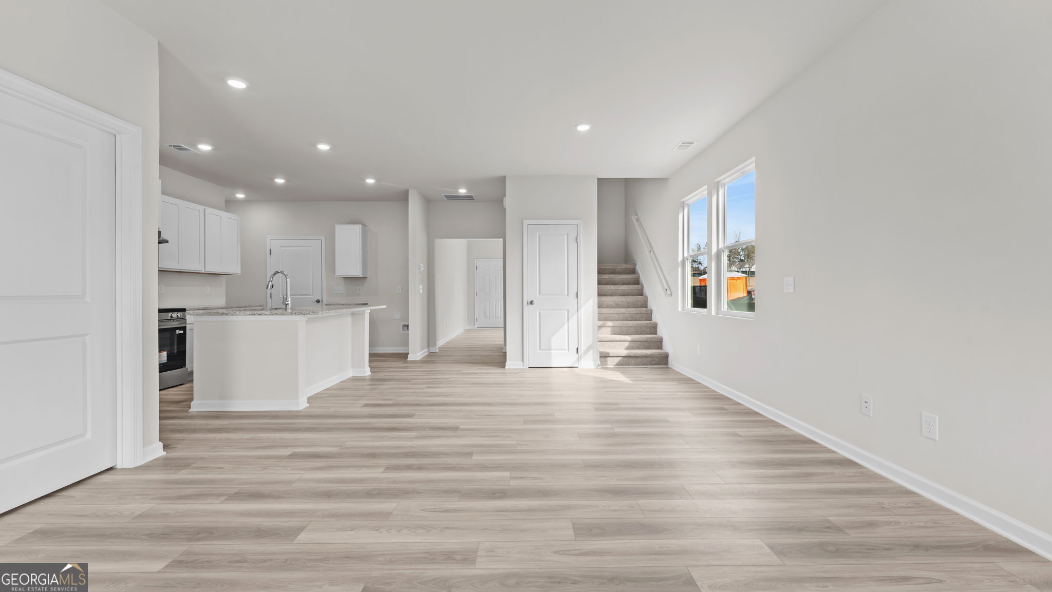 46 Umber Lane Newnan, GA 30263 - Photo 4 of 10 a view of kitchen with wooden floor