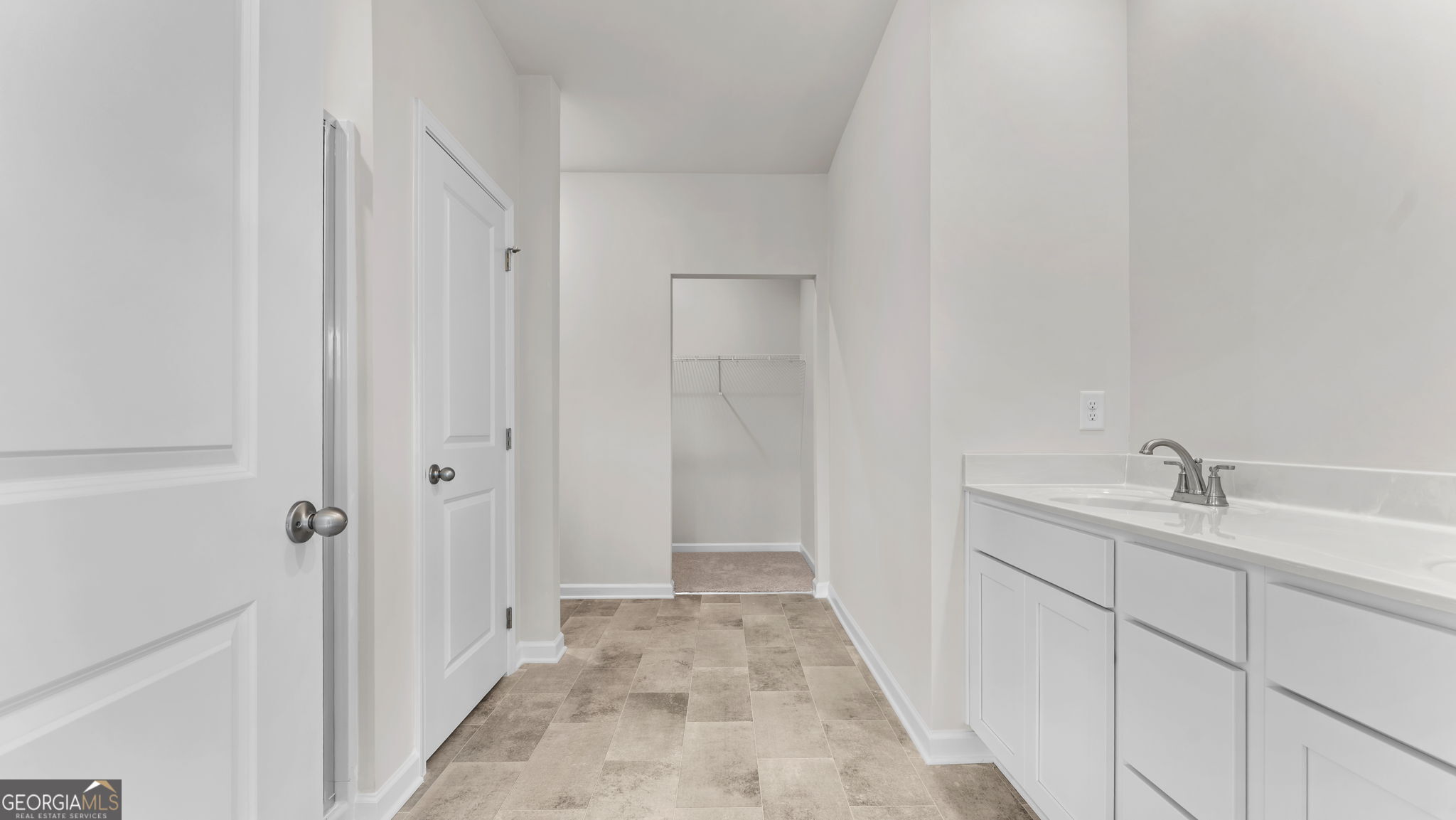 46 Umber Lane Newnan, GA 30263 - Photo 8 of 10 a bathroom with a sink and mirror