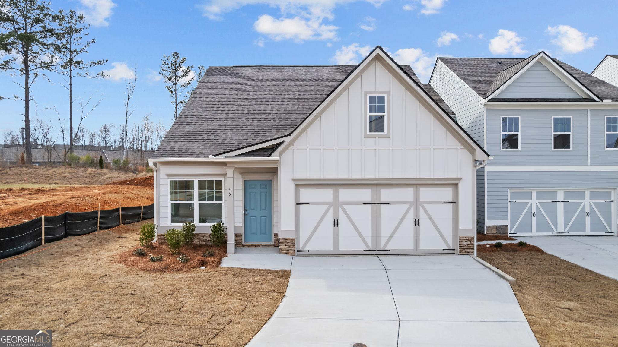 46 Umber Lane Newnan, GA 30263 - Photo 9 of 10 a view of a white house with swimming pool in front of it