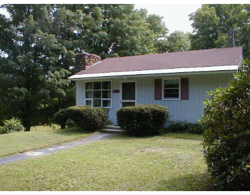 125 Queen Lake Road Phillipston, MA 01331 - Photo 1 of 3 a view of a house with a garden