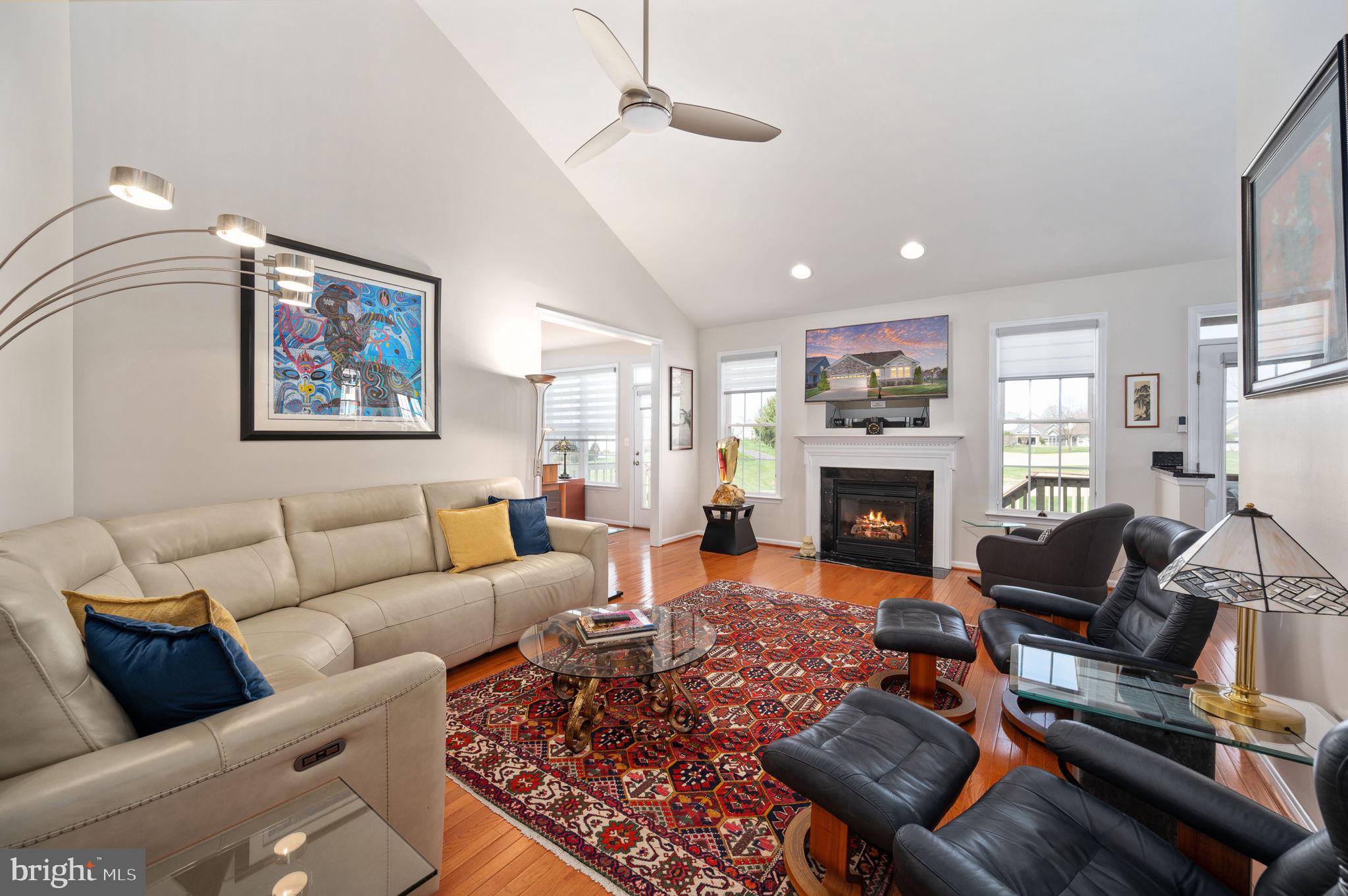 13700 Fieldstone Way Gainesville, VA 20155 - Photo 15 of 53 a living room with furniture fireplace and window