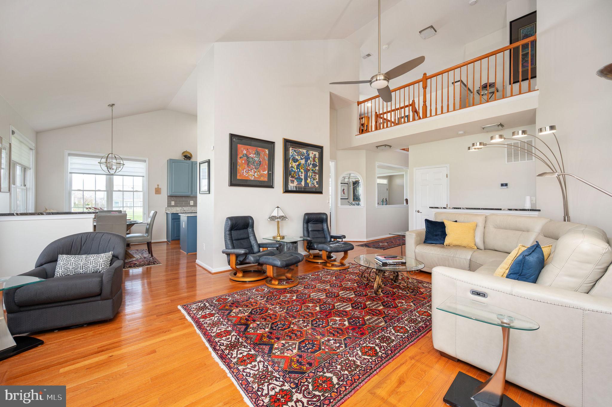 13700 Fieldstone Way Gainesville, VA 20155 - Photo 16 of 53 a living room with furniture and a fireplace