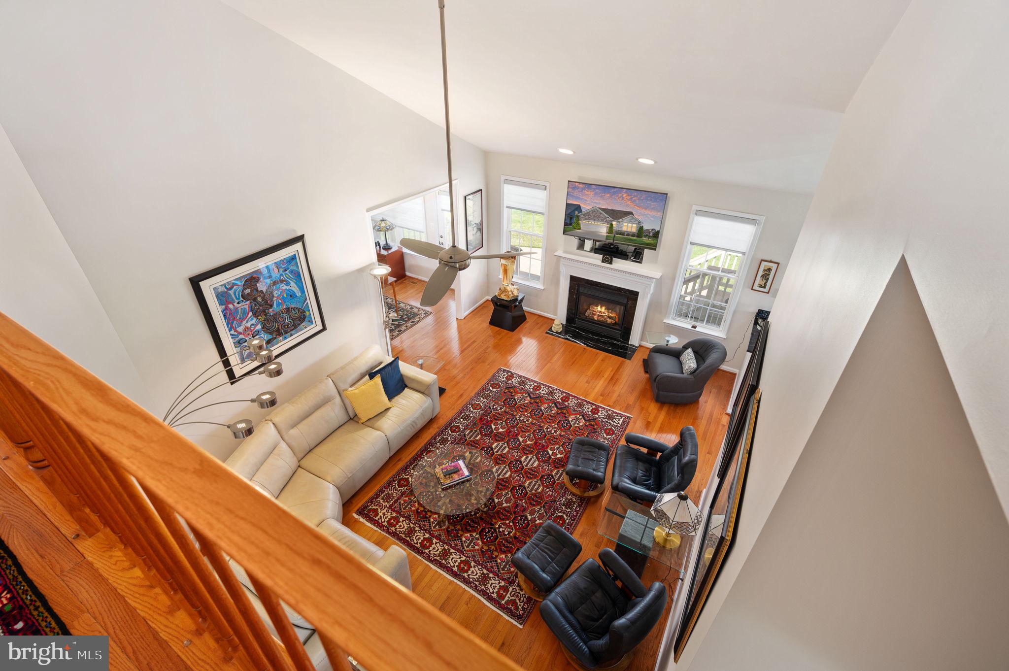 13700 Fieldstone Way Gainesville, VA 20155 - Photo 29 of 53 a living room with furniture and a flat screen tv