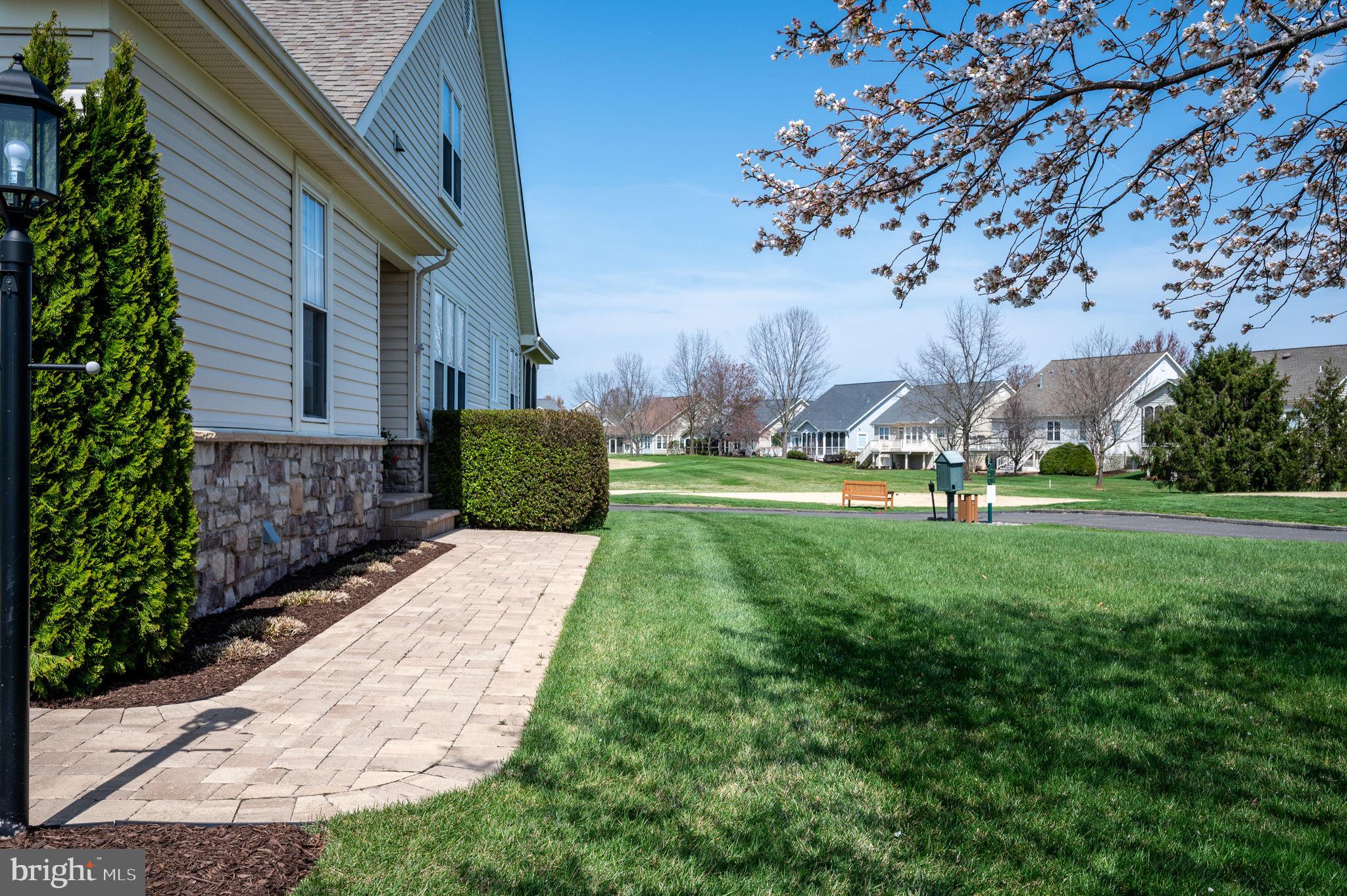13700 Fieldstone Way Gainesville, VA 20155 - Photo 3 of 53 a front view of a house with garden