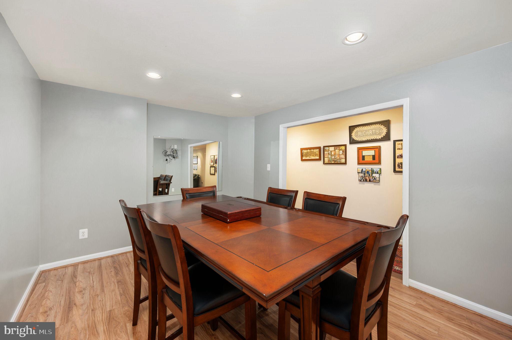 13700 Fieldstone Way Gainesville, VA 20155 - Photo 35 of 53 a view of a dining room with furniture