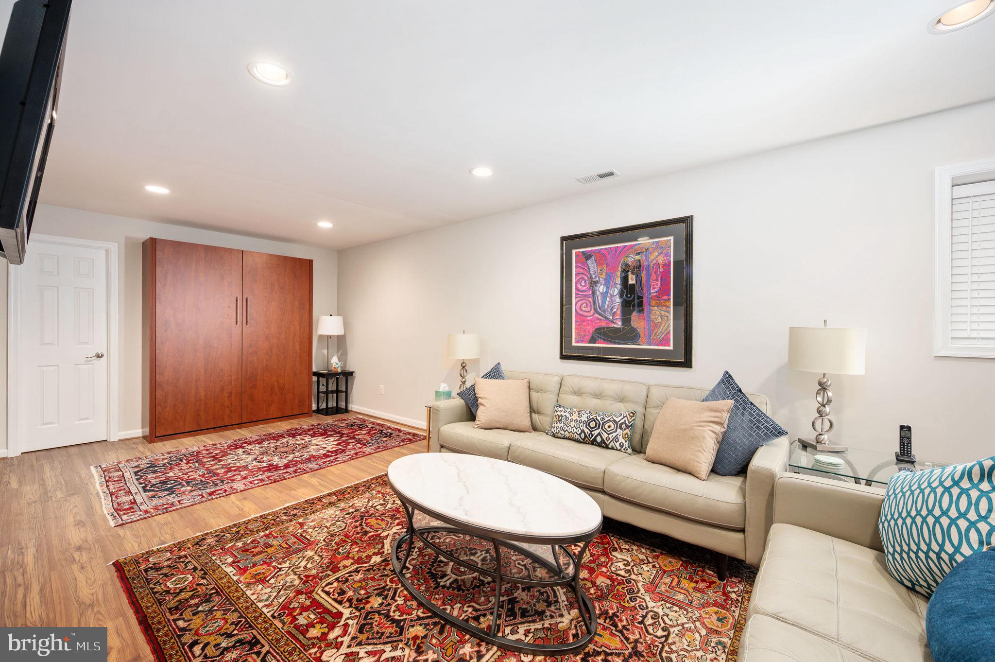 13700 Fieldstone Way Gainesville, VA 20155 - Photo 38 of 53 a living room with furniture rug and window