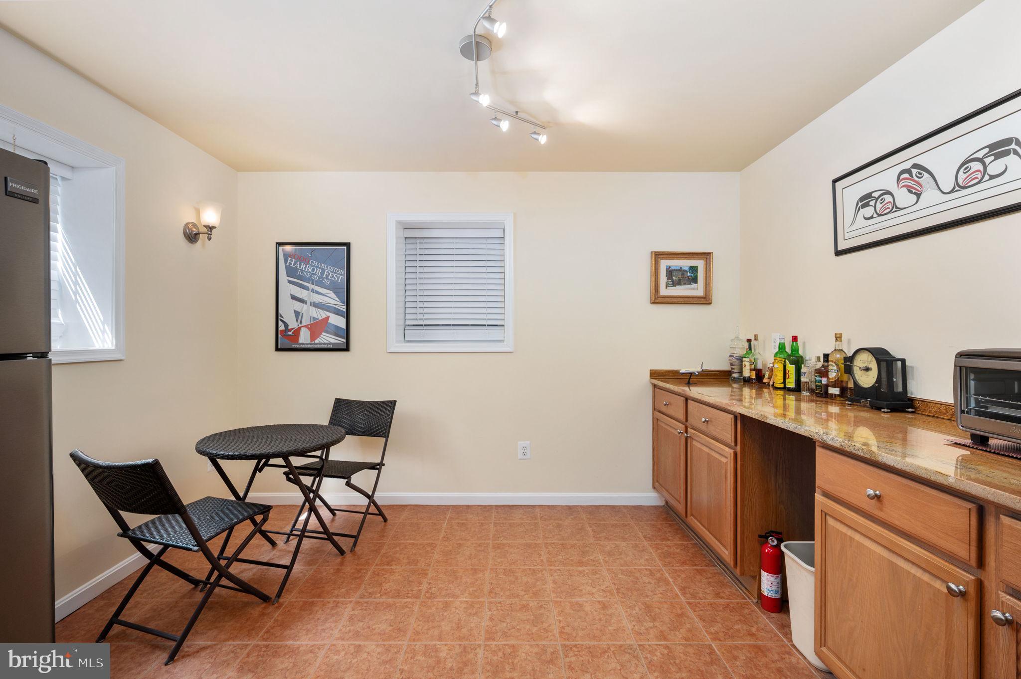 13700 Fieldstone Way Gainesville, VA 20155 - Photo 40 of 53 a kitchen with stainless steel appliances granite countertop a sink and cabinets