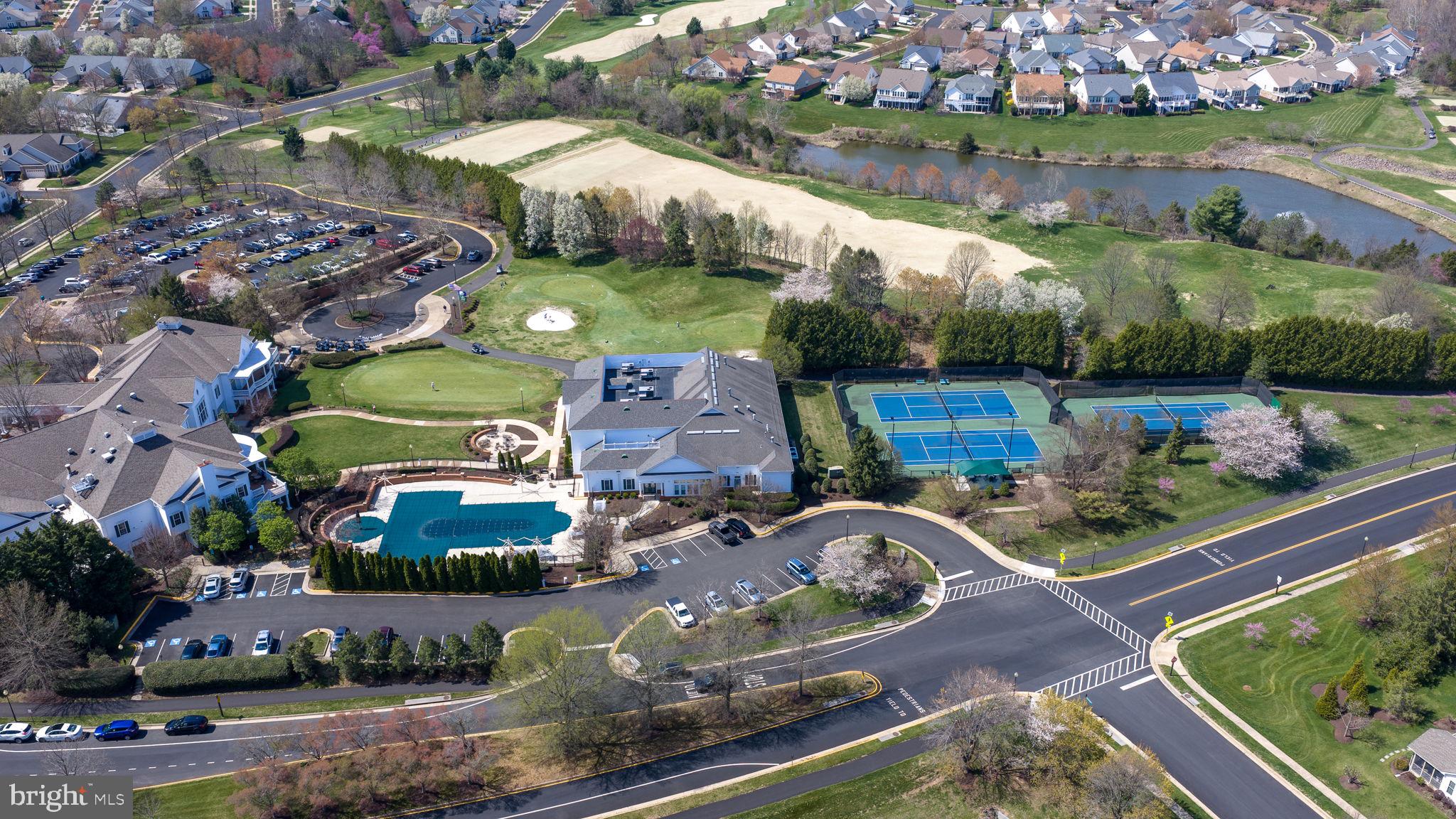 13700 Fieldstone Way Gainesville, VA 20155 - Photo 47 of 53 an aerial view of a house with a garden and lake view