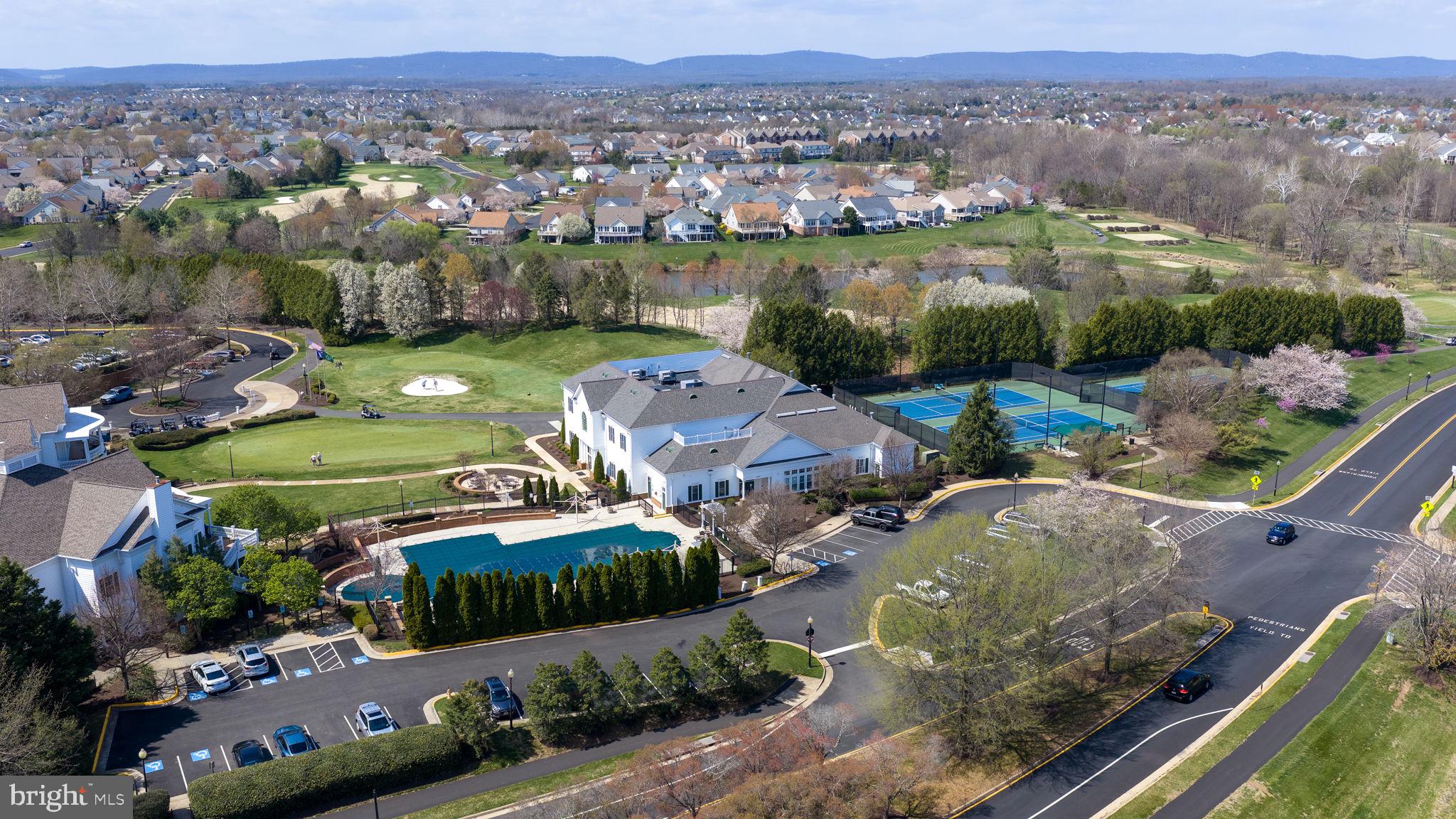 13700 Fieldstone Way Gainesville, VA 20155 - Photo 48 of 53 an aerial view of a house with a lake view