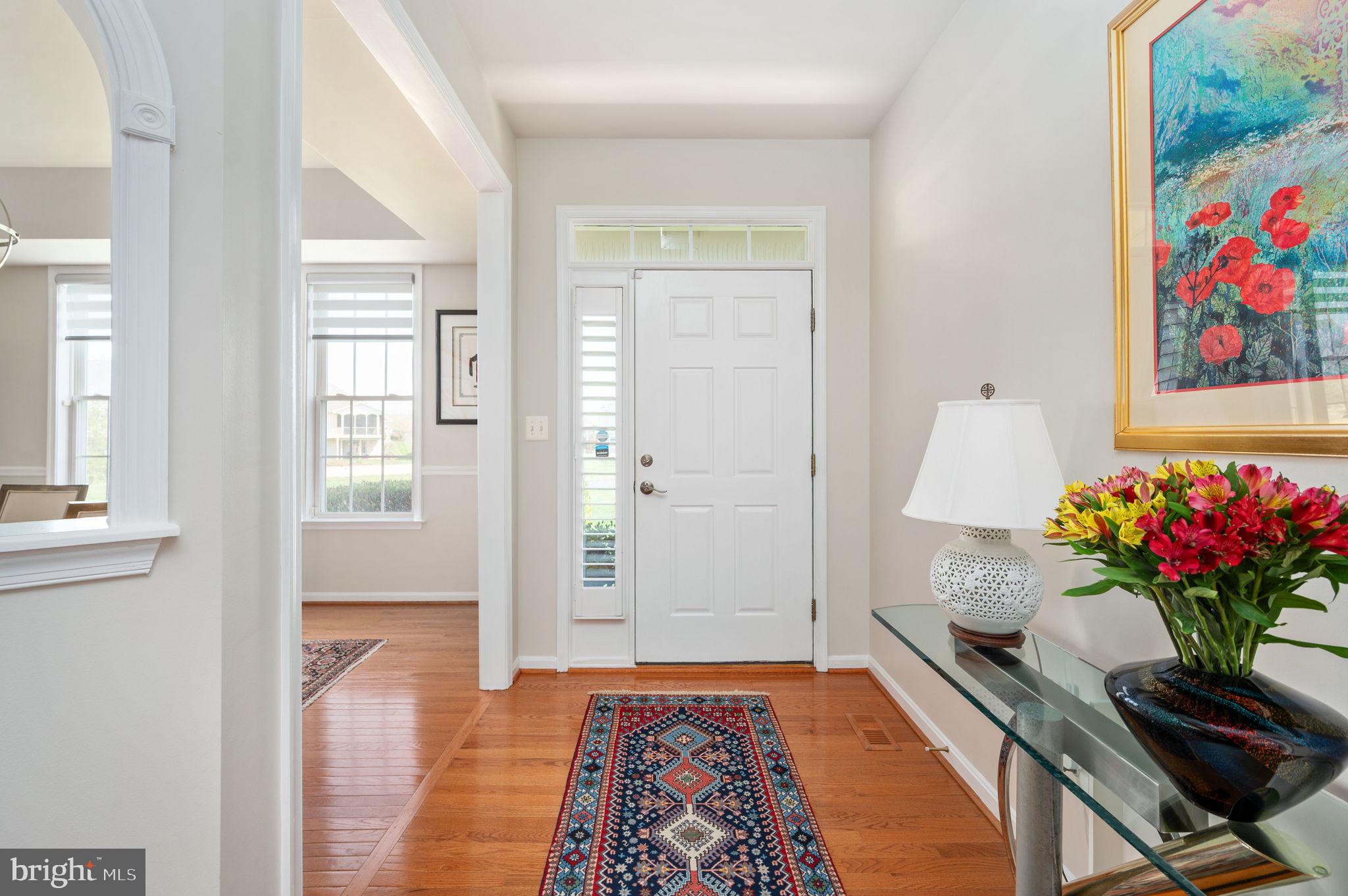 13700 Fieldstone Way Gainesville, VA 20155 - Photo 6 of 53 a view of room with furniture and wooden floor