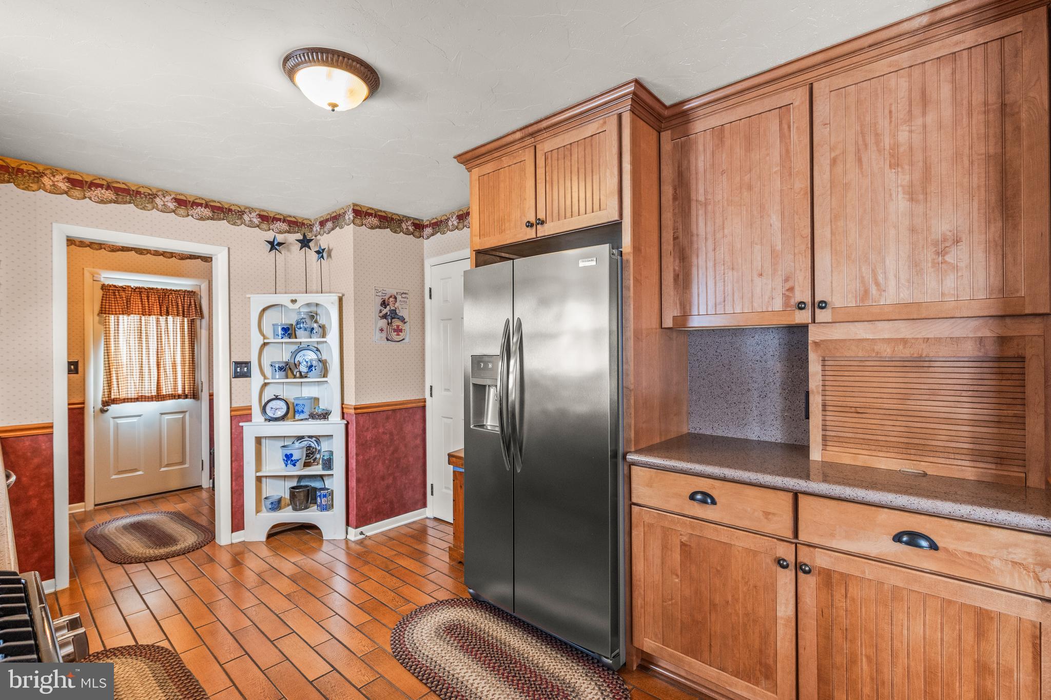 136 Conewago Drive Hanover, PA 17331 - Photo 15 of 41 a kitchen with stainless steel appliances granite countertop a refrigerator and a stove top oven