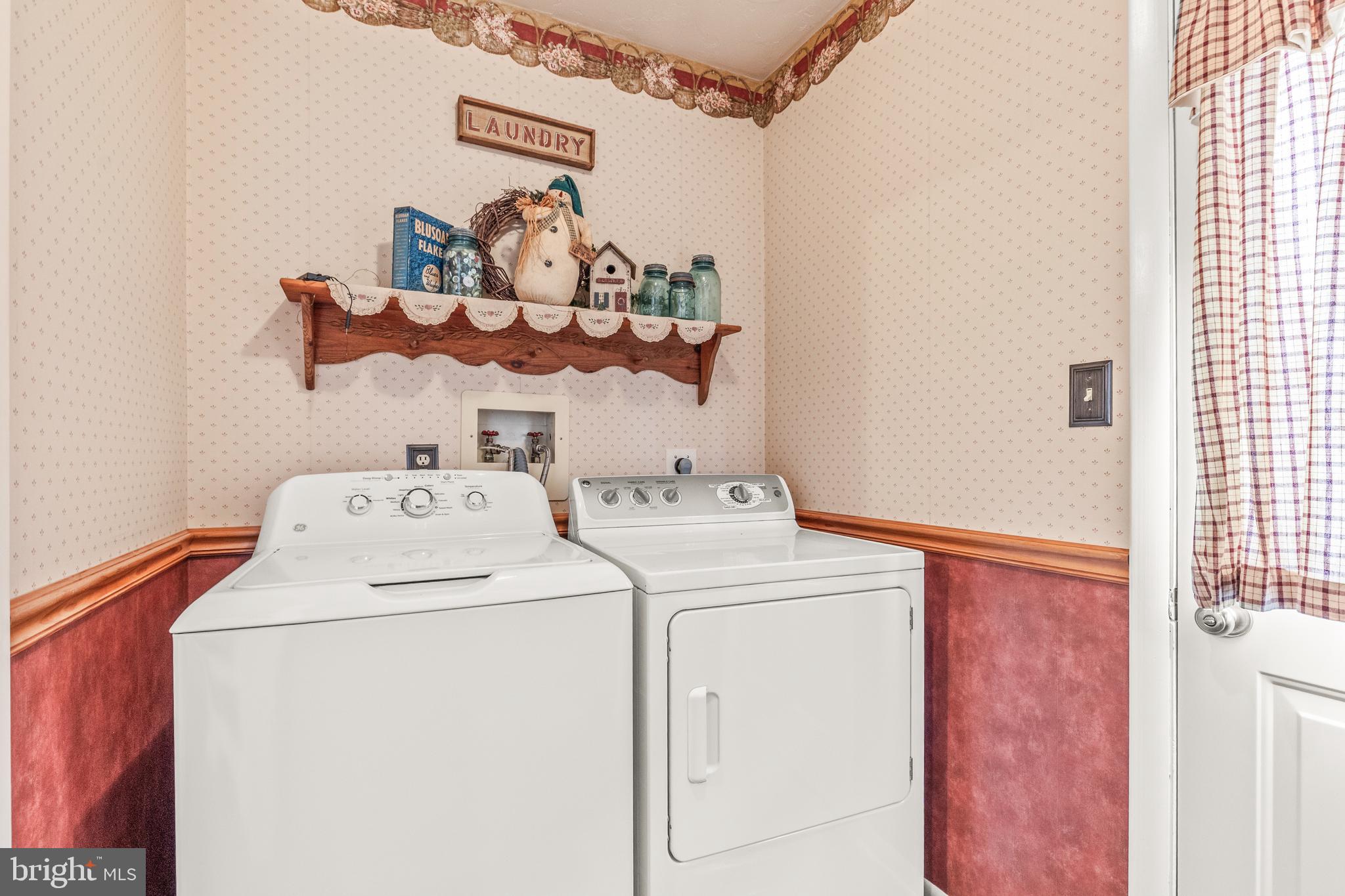 136 Conewago Drive Hanover, PA 17331 - Photo 16 of 41 a utility room with dryer and washer