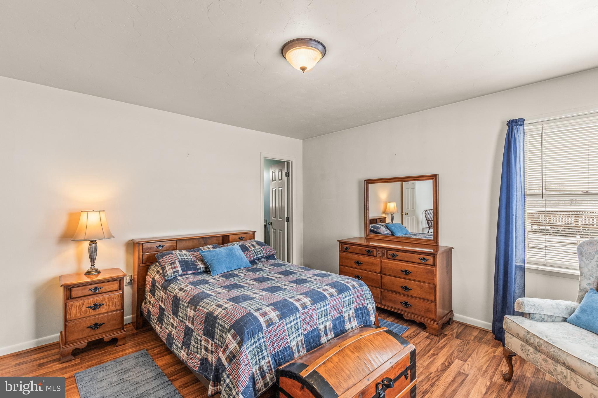 136 Conewago Drive Hanover, PA 17331 - Photo 18 of 41 a bedroom with a bed and wooden floor