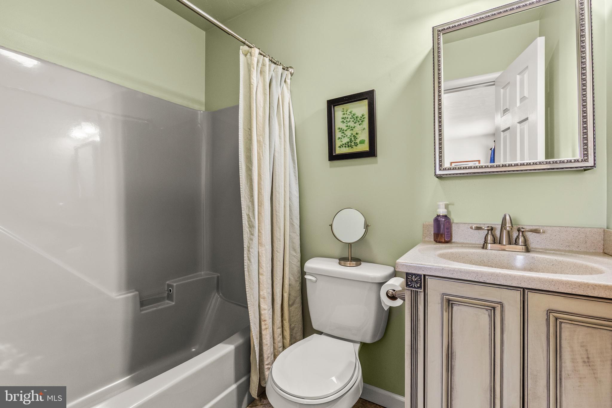 136 Conewago Drive Hanover, PA 17331 - Photo 20 of 41 a white toilet sitting next to a bathroom sink