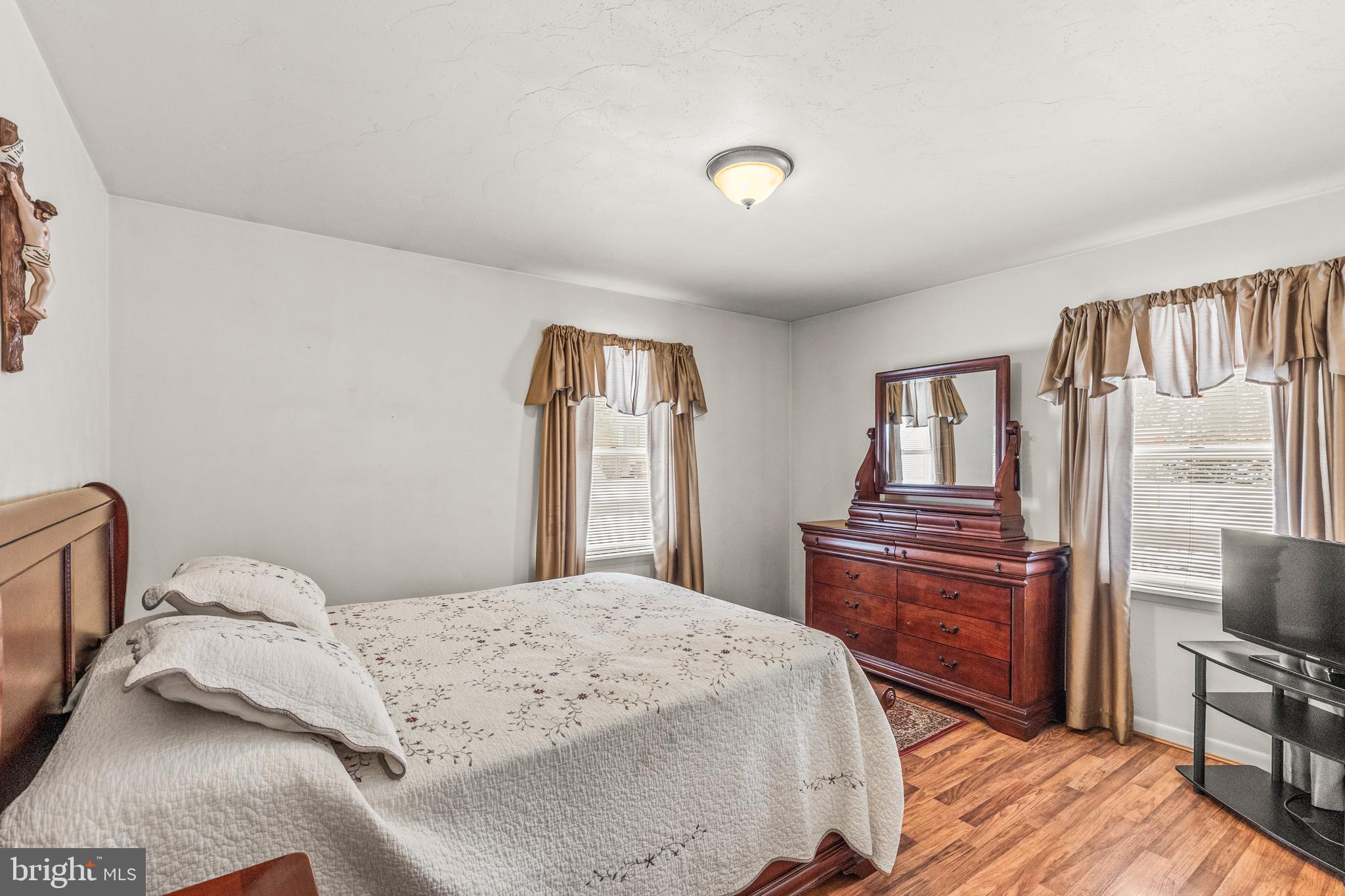 136 Conewago Drive Hanover, PA 17331 - Photo 21 of 41 a bedroom with a bed and wooden floor