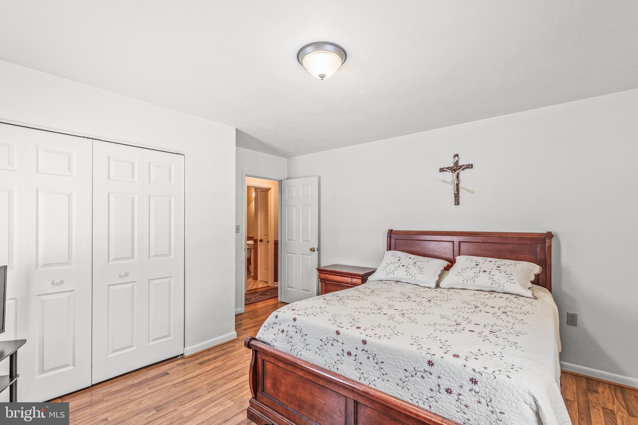 136 Conewago Drive Hanover, PA 17331 - Photo 22 of 41 a bedroom with a bed and a mirror