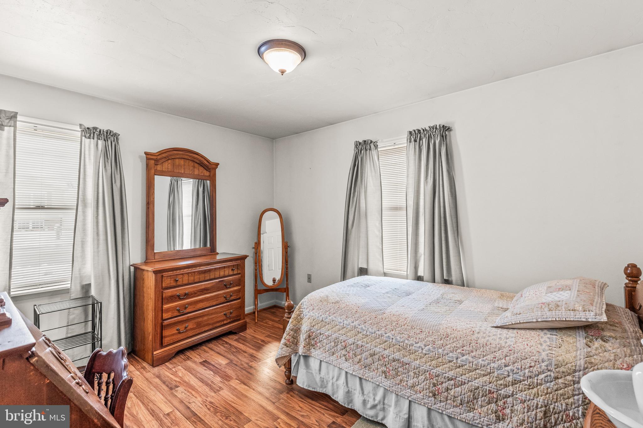 136 Conewago Drive Hanover, PA 17331 - Photo 23 of 41 a bedroom with a bed next to a large window