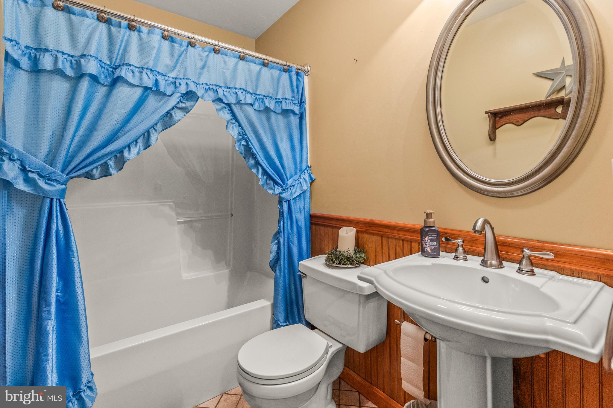 136 Conewago Drive Hanover, PA 17331 - Photo 25 of 41 a bathroom with a sink a toilet and a mirror