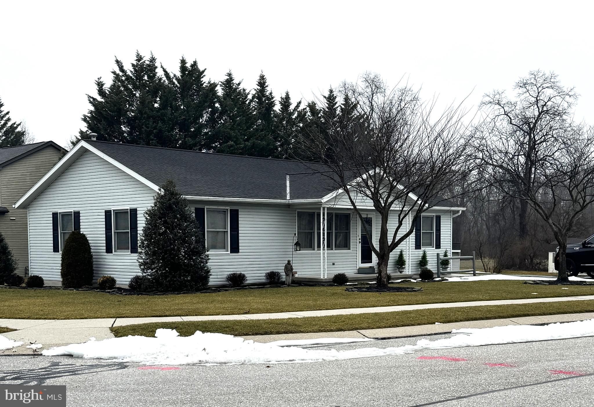 136 Conewago Drive Hanover, PA 17331 - Photo 4 of 41 a front view of house with yard and trees around