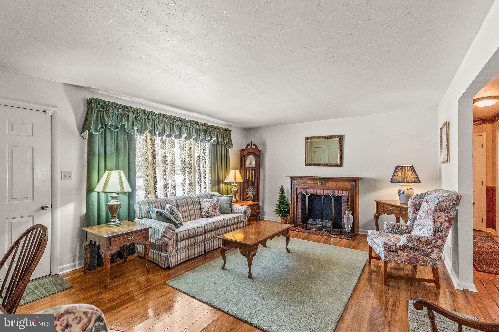 136 Conewago Drive Hanover, PA 17331 - Photo 8 of 41 a living room with furniture large window and a fireplace