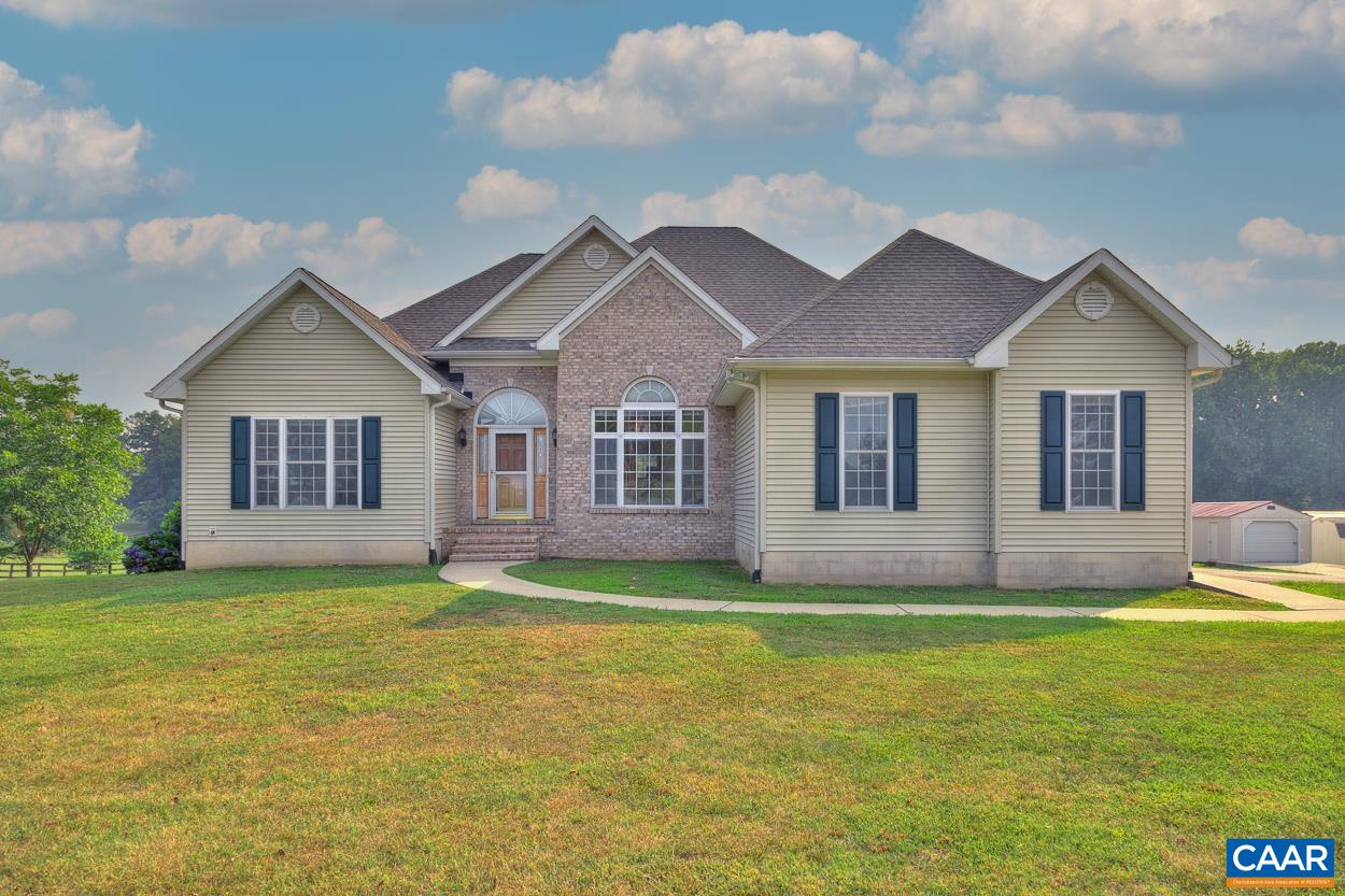 1908 Hollands Road Palmyra, VA 22963 - Photo 1 of 41 a house that has a big yard in front of it