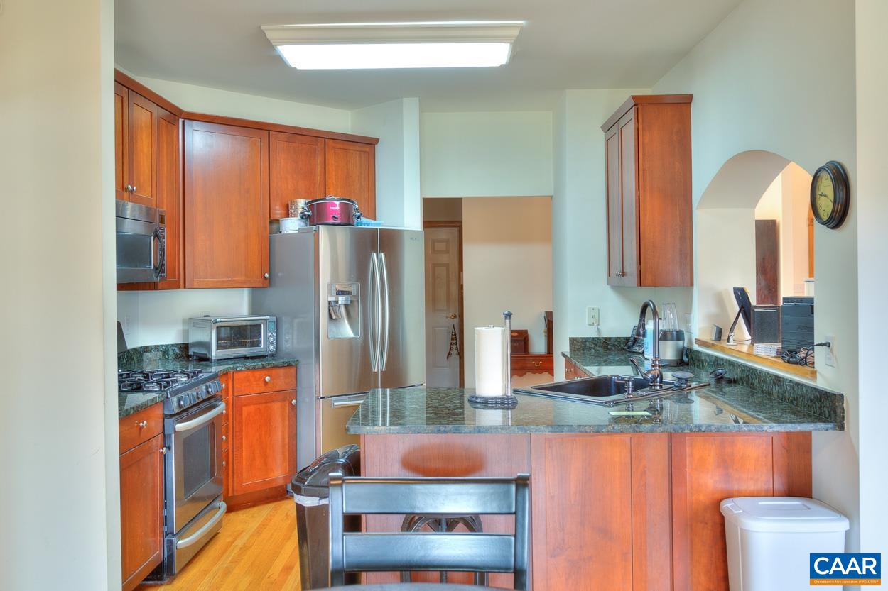 1908 Hollands Road Palmyra, VA 22963 - Photo 15 of 41 a kitchen with stainless steel appliances granite countertop a refrigerator and a stove