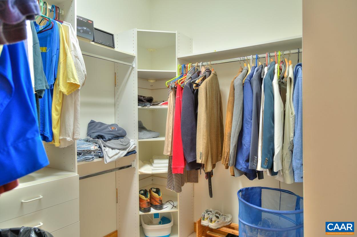 1908 Hollands Road Palmyra, VA 22963 - Photo 29 of 41 a view of walk in closet with clothes and shoes